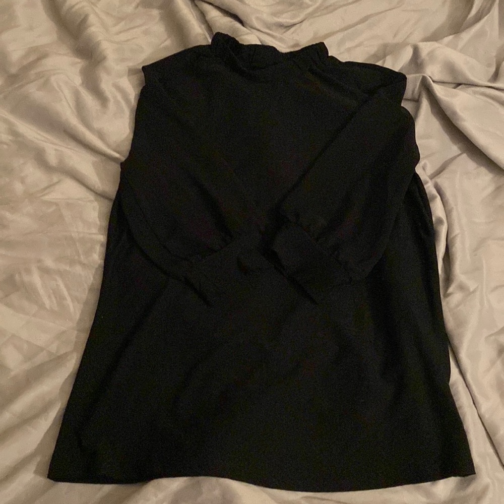 Black shirt with sheer sleeves